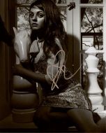 Mila Kunis - (Earn 7 reward points on this item worth $1.75)